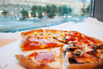 pizza in the cafe near the window