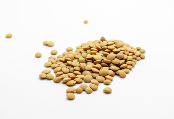Lentils seeds isolated on white background.