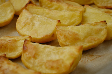 chopped baked potato on a baking sheet