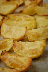 chopped baked potato on a baking sheet