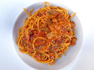 spagetti all'Amatriciana, gourmet pasta plate top view close up