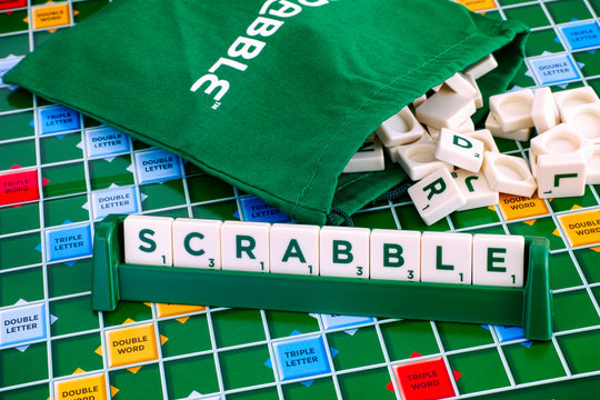 Tambov, Russian Federation - May 02, 2018 Scrabble Board Game. Word Scrabble from letter tiles in the tile rack on  gameboard with drawstring letter bag.