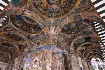 Fototapeta na wymiar Religious frescoes on the treatises from the Bible, painted on the church wall in Rila Monastery, Bulgaria