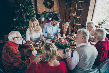 Photo of big large friendly family having rest relax together with grandparents grandchildren son and daughter couple husband wife enjoying company of each other senior mature people speaking