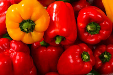 colorful bell peppers on display at the market