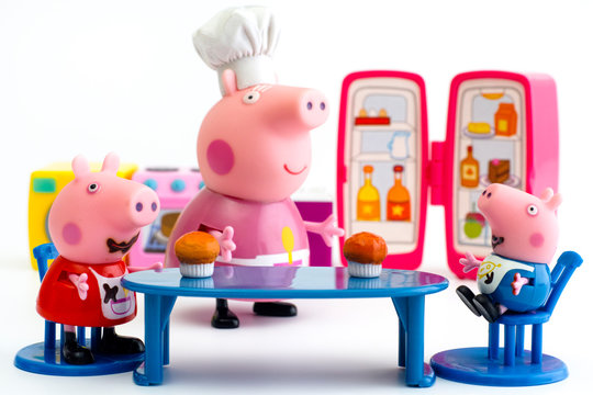 Tambov, Russian Federation - December 16, 2015 Peppa Pig and George Pig sit at the table on Granny Pig kitchen