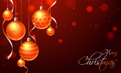 Brown bokeh background decorated with shiny hanging baubles and ribbons for Merry christmas festival celebration concept.