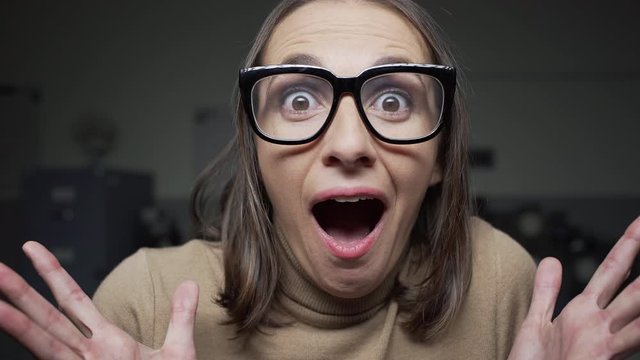 Shocked woman receiving unexpected news