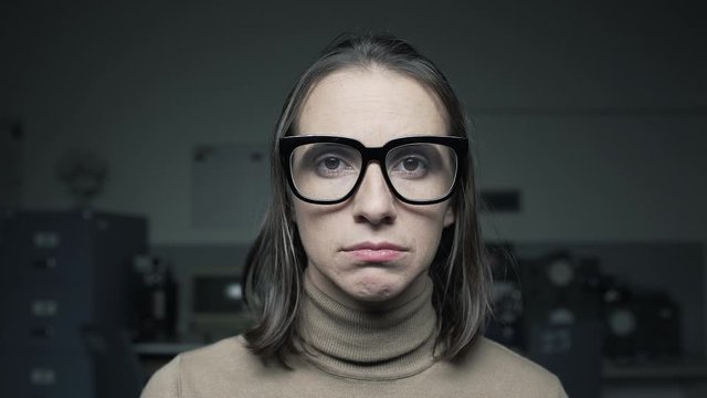 Confused woman reading on the computer screen