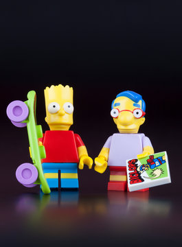 Tambov, Russian Federation - April 30, 2014 Lego Bart Simpson and his best friend Milhouse Mussolini Van Houten minifigures on black background. Studio shot.