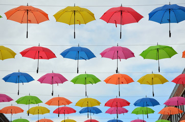 Obraz na płótnie Canvas Bunch of Colorful Umbrellas Decorating the Sky