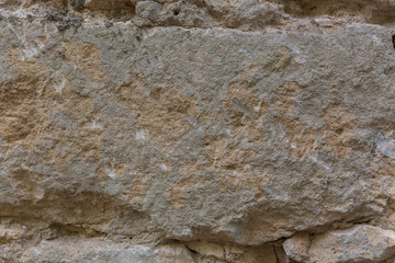 texture of stone wall a part of ancient masonry that having been made from limestone