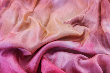Pink and orange silk fabric.