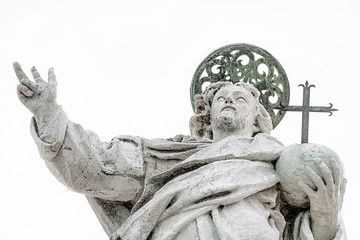 Holly priest with cross and nimbus at the roof of Church of San Giorgio Maggiore in Venice isolated...