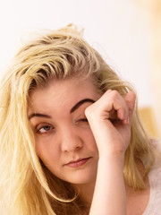 Fototapeta premium Woman feeling tired in bathroom