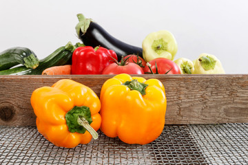 Peppers, courgettes and other vegetables lying on the table