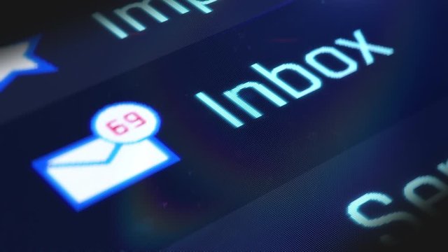 Mouse cursor pressing on inbox folder, incoming e-mails, texts, communication. Computer screen close-up