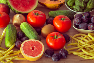 healthy diet, kitchen table full of fruits and vegetables