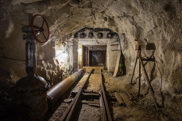 Underground mine ore shaft tunnel drift with rails underground