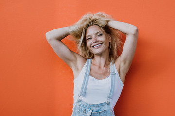 Fototapeta premium Beautiful girl lifestyle moments on colored backgrounds