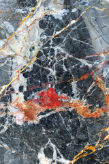 Patterned natural of dark gray marble pattern (Russia Gold) texture for design.