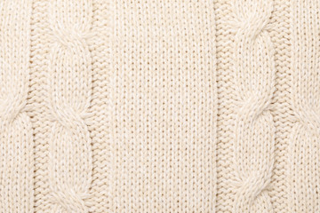 Beige melange cable knitting fabric textured background