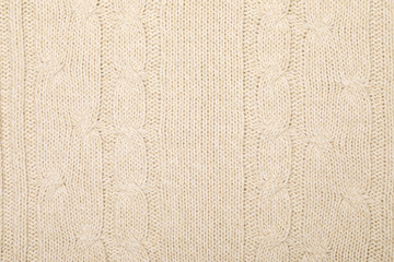 Beige melange cable knitting fabric textured background