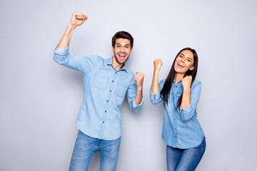 Portrait of his he her she nice attractive charming lovely cute cheerful cheery couple celebrating attainment isolated over light white gray pastel color background