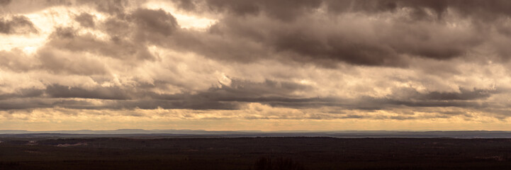 Strong cloudscape while sunset over the land