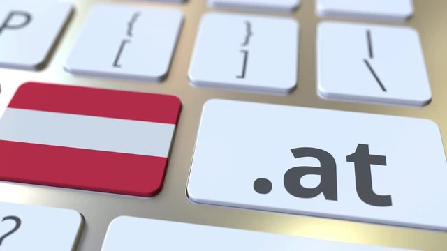Austrian domain .at and flag of Austria on the buttons on the computer keyboard. National internet related 3D animation