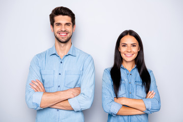 Close-up portrait of his he her she nice attractive lovely charming cheerful cheery content couple partners wearing casual folded arms isolated over light white pastel color background