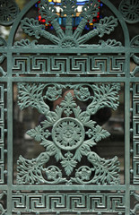 Beautiful ornate tomb door in the Pere Lachaise cemetery, Paris