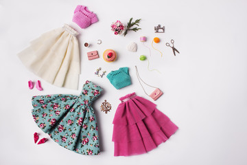 Hand-made spring clothes for 11-inch doll. Sewing accessories