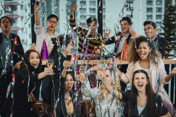 Party activities Celebration Group Friends office have fun with the new year. dance party. The...