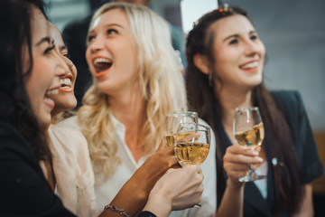 Team Successful Corporate Celebrations, Business event office meeting, Friends Champagne, Cooperative, Employees. Motivating office workers. Event, Friends, Girl holding a Glass. happiness talking. 