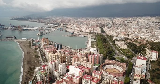Malaga with Placa de Torros from castle in sunny time. Andalusia, Spain 