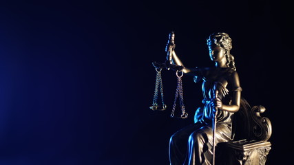 The Statue of Justice - dark blue background. The Statue of Justice - lady justice or Iustitia the...