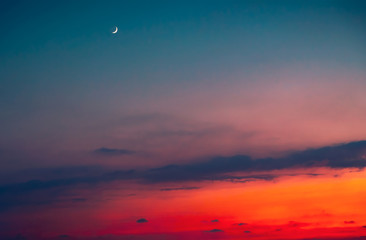 Amazing sunset with a moon