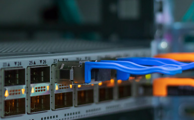Network switch. Modern network switch speed 40 - 100 Gigabit Ethernet ports. Closeup of optical...