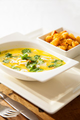 bowl of vegetable fish soup