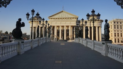building in skopje at river during autumn
