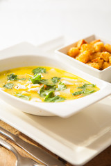 bowl of vegetable fish soup