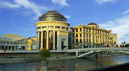 Fototapeta premium building in skopje at river during autumn