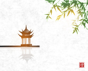 Pagoda temlple over the water surface and green bamboo tree on rice paper backgrund. Traditional Japanese ink wash painting sumi-e. Hieroglyph - clarity.