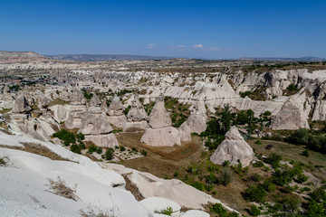 View of Gereme national park in Cappadocia, Turkey. Textured clouds over endless bizarre...