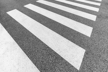 Pedestrian crossing. Pedestrian zebra on the road.