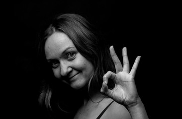 Obraz premium Young Woman Showing Expresion Black & White Isolated 