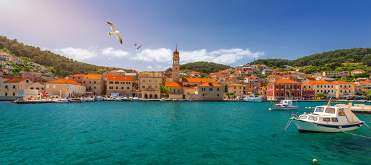 Panorama of picturesque town Pucisca in Croatia, Island Brac, Europe. Pucisca town mediterranean...