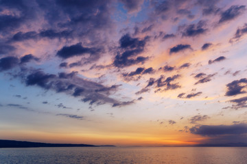 Obraz premium Beautiful sunset or sunrise above the sea. Tropical sunset or sunrise over sea. Colourful sunset or sunrise over water.