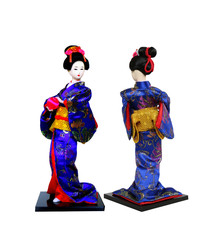 Japanese souvenir of  geisha doll in kimono dress with ball on hand,